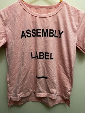 Assembly Label Pink Tee with Black Logo